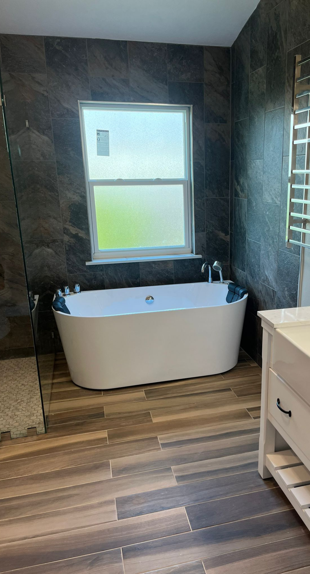 An amazing bathroom that our company renovated!